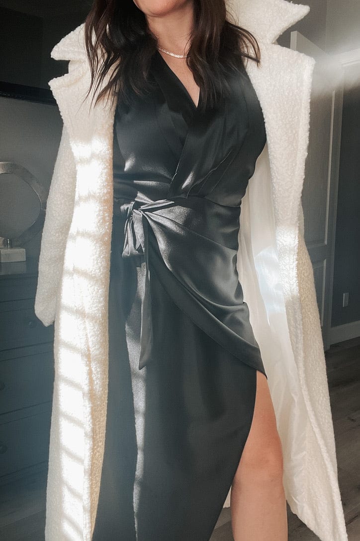 Audrey Sleeveless Asymmetrical Satin Midi Wrap Dress in Black - Blooming Daily