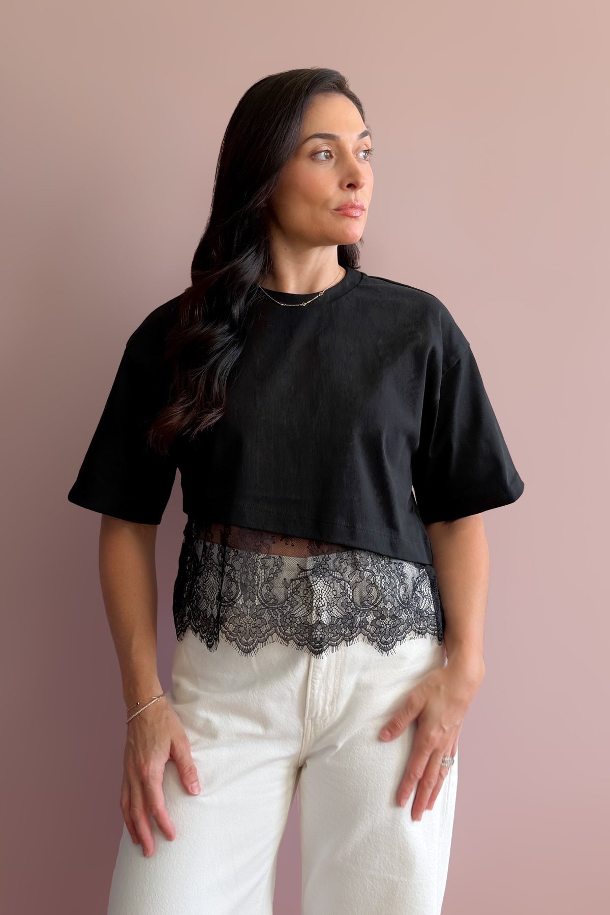 Elevated black cotton basic with cropped tee overlay and delicate sheer lace hem