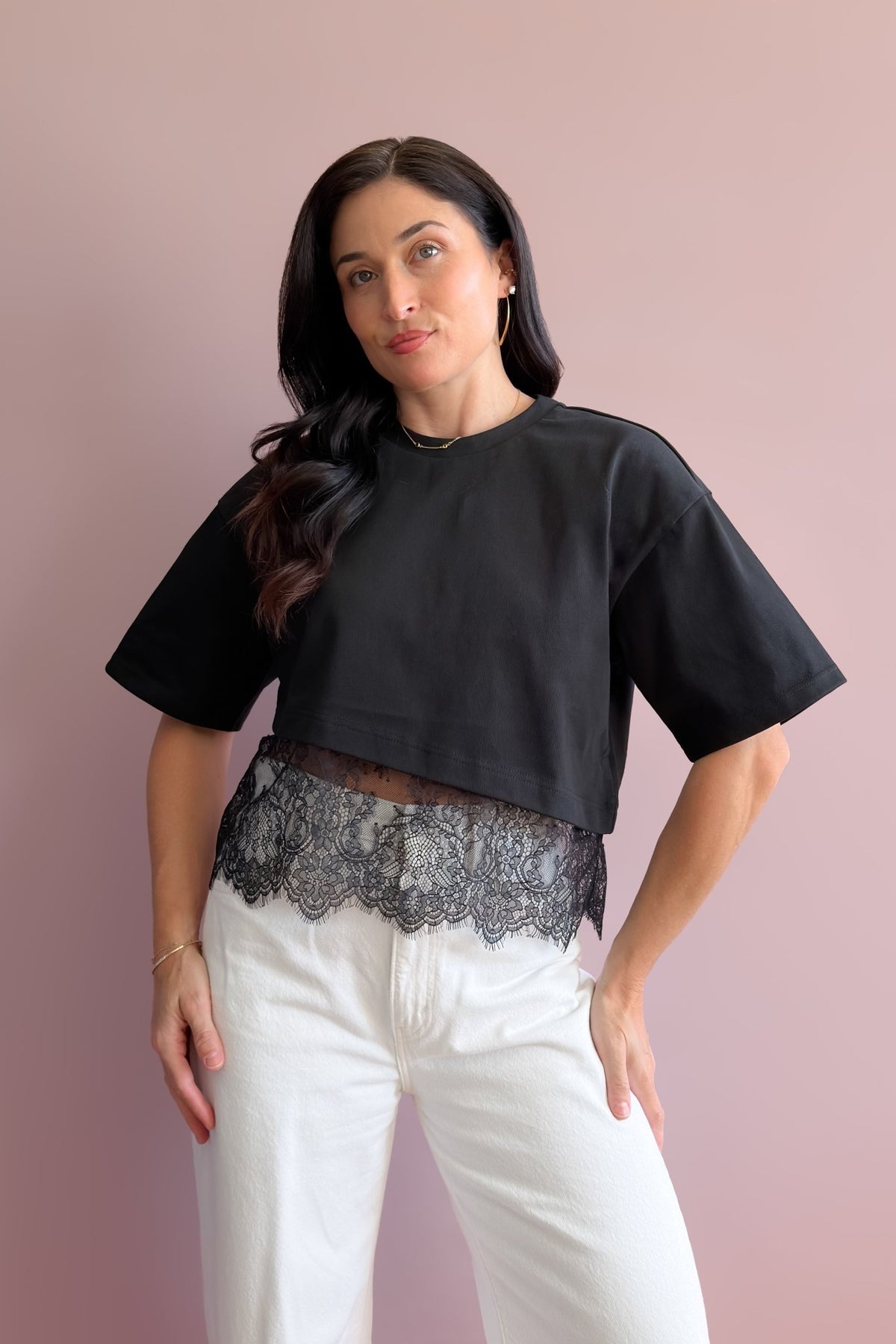 Women’s black lace hem T-shirt with relaxed short sleeves and elevated cropped silhouette