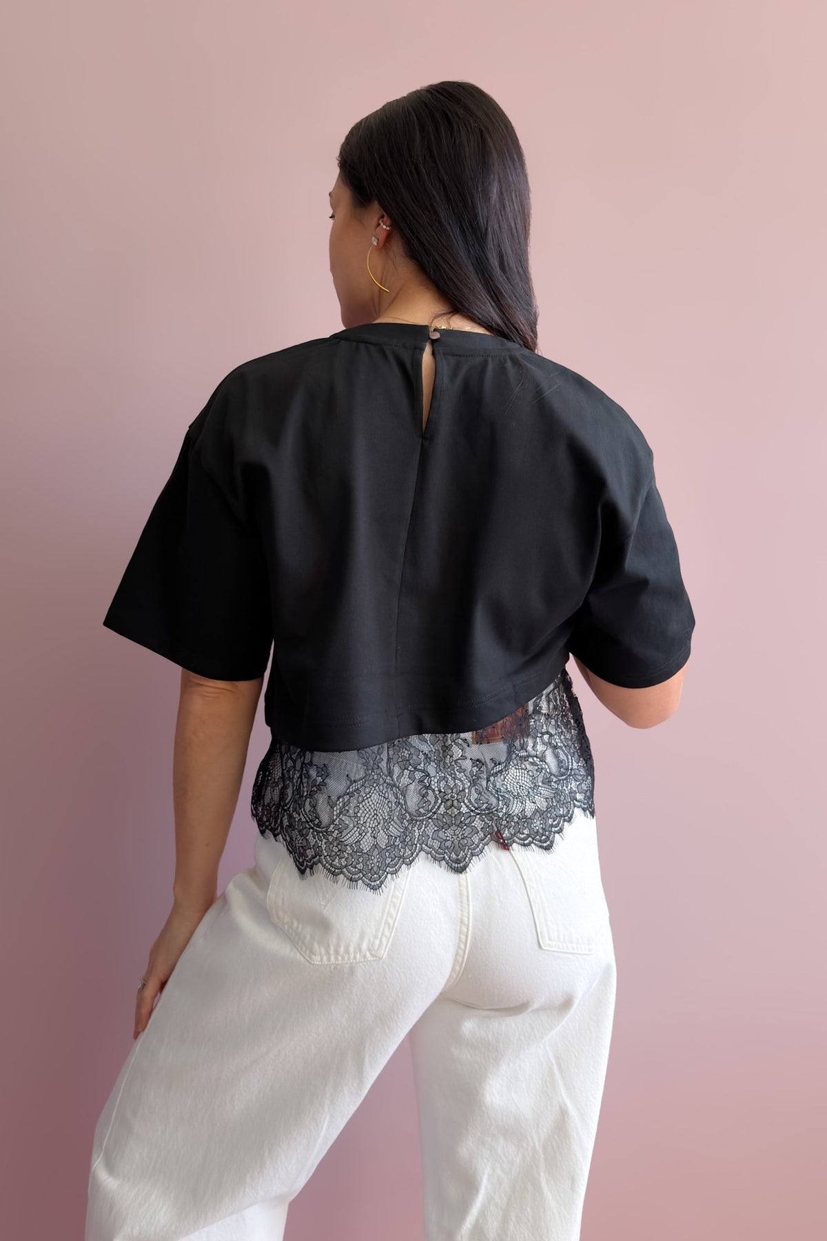 Black cotton lace trim top styled with white denim for an elevated everyday outfit