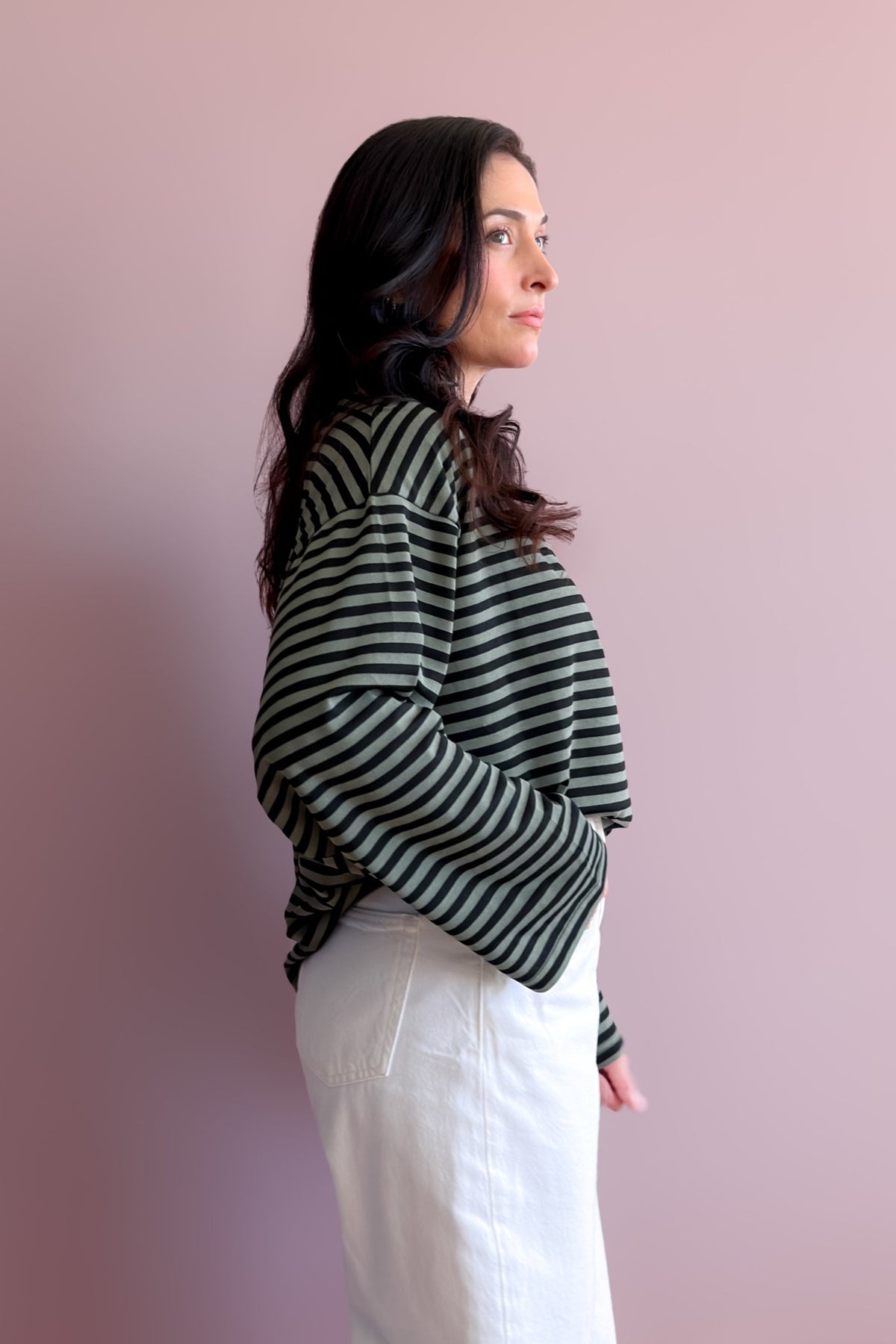 Women’s black and olive striped long sleeve top with wide sleeves and oversized silhouette