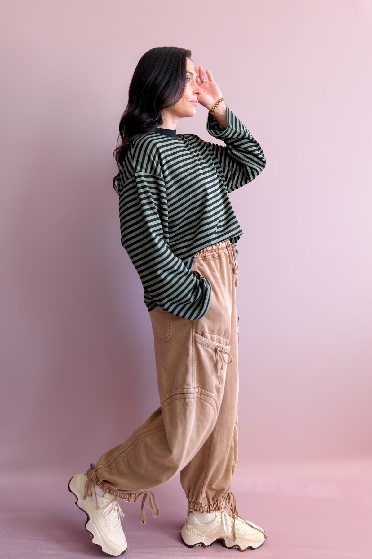 Relaxed black and olive striped long sleeve shirt with wide sleeves and soft drape