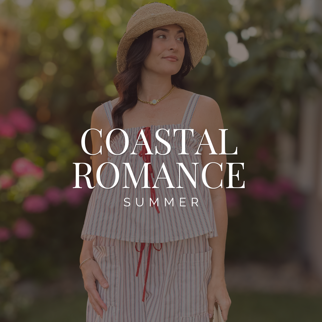 Blooming Daily summer collection graphic featuring a woman in a lightweight striped matching set and woven sun hat with text reading “Coastal Romance Summer.