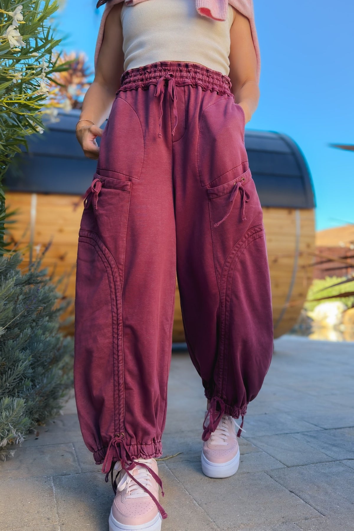 Varsity burgundy mineral wash wide leg cargo pants for women with drawstring waist and utility pockets