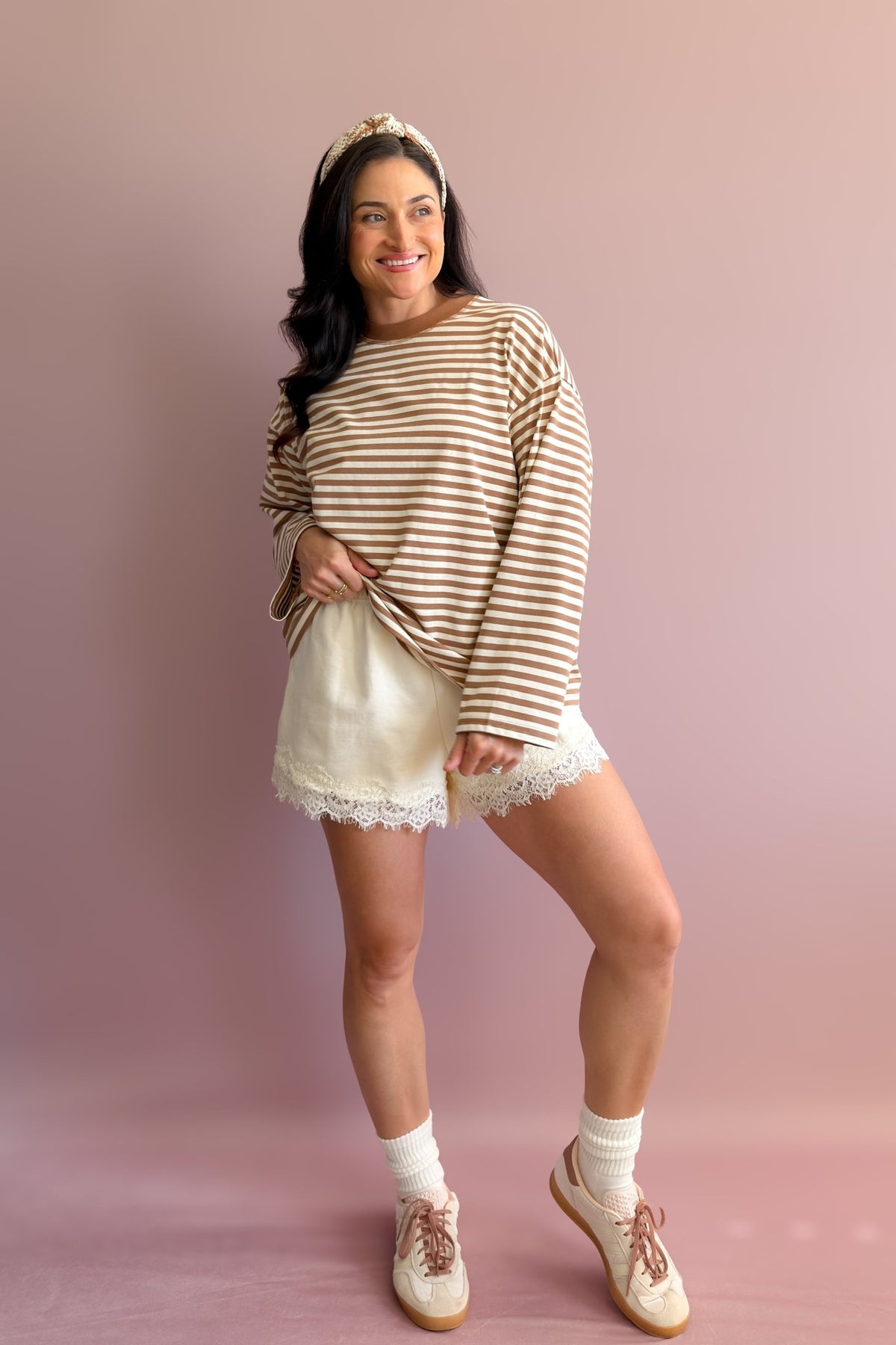 Camel and ivory striped long sleeve top styled with denim for a classic preppy outfit