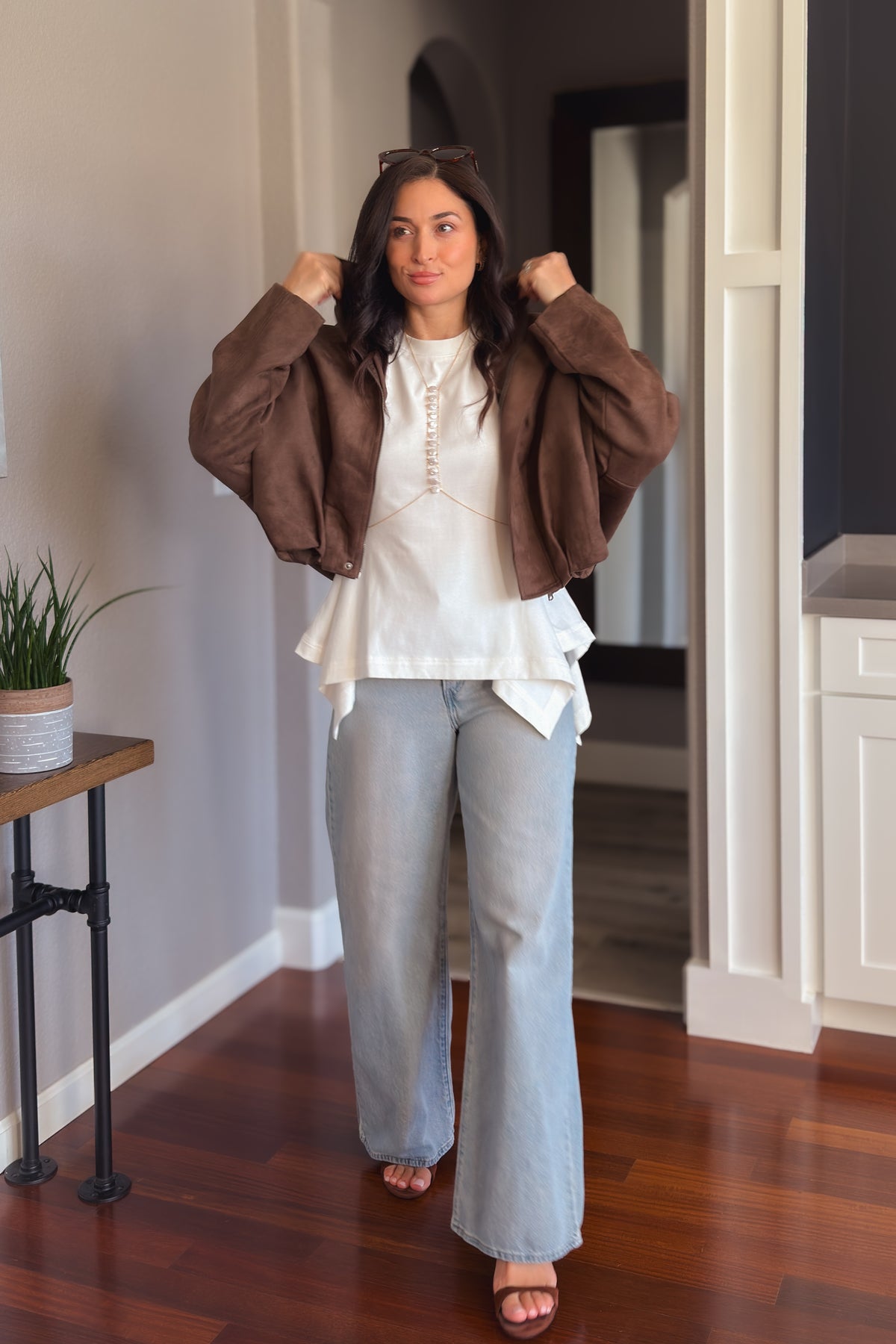 Chocolate brown microsuede jacket with a relaxed fit, zip front and soft lightweight feel for layering.