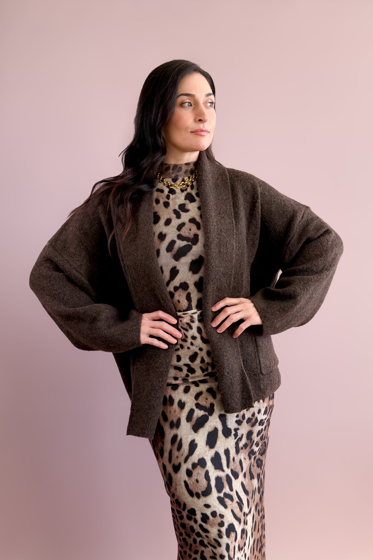 Women's chocolate brown cardigan featuring a soft fuzzy knit and relaxed oversized fit.