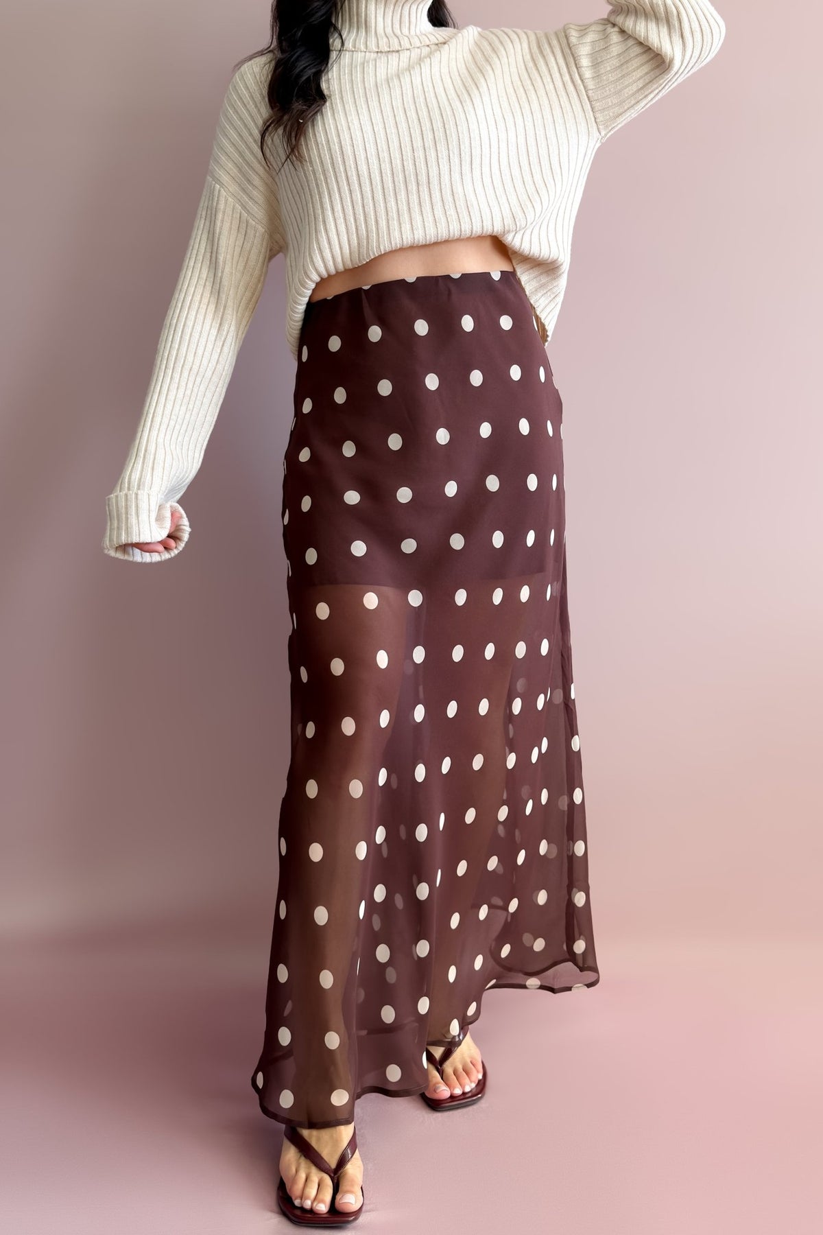 Brown and cream polka dot maxi skirt with lightweight sheer fabric and elegant flowing movement