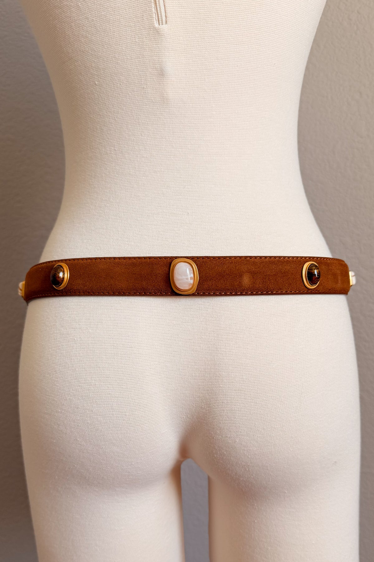 Cognac suede belt styled with cropped white shirt and denim