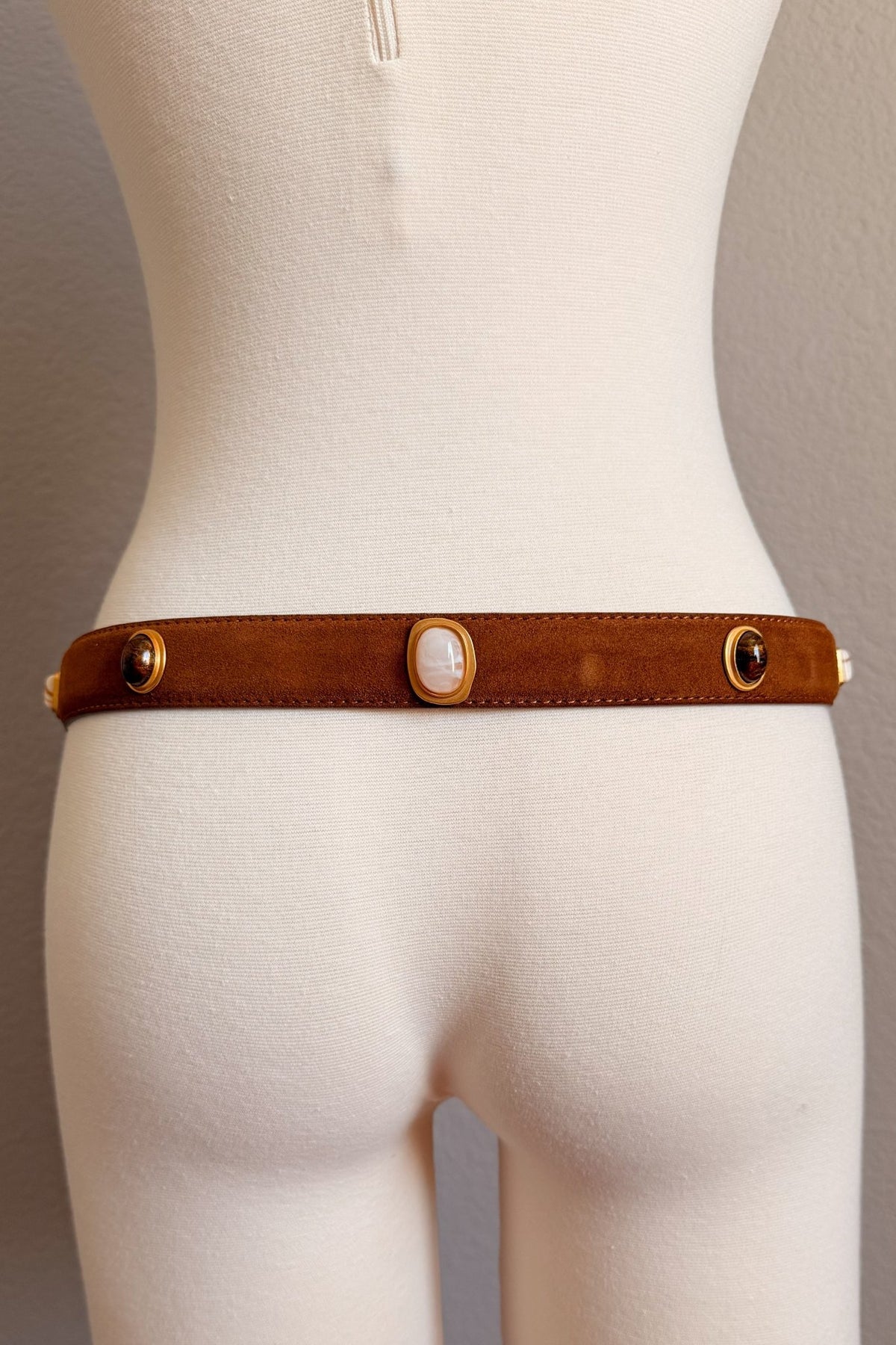 Cognac suede belt styled with cropped white shirt and denim