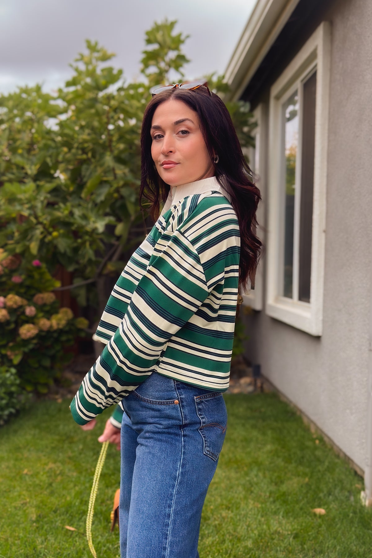 Green striped long sleeve polo shirt with boxy silhouette and contrast collar