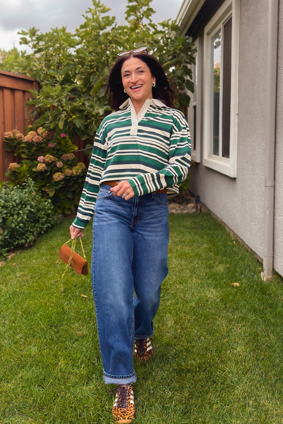 Lightweight green striped polo top with cropped fit and long relaxed sleeves
