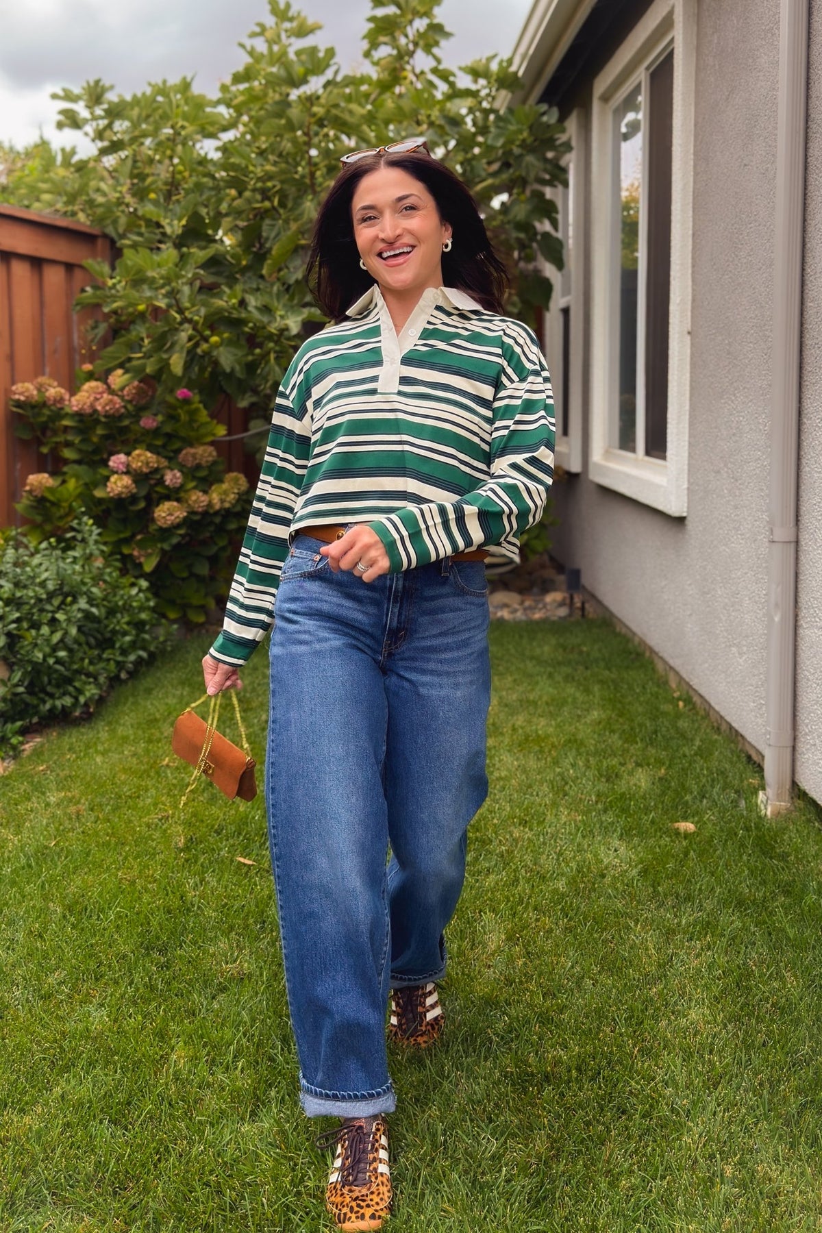 Lightweight green striped polo top with cropped fit and long relaxed sleeves