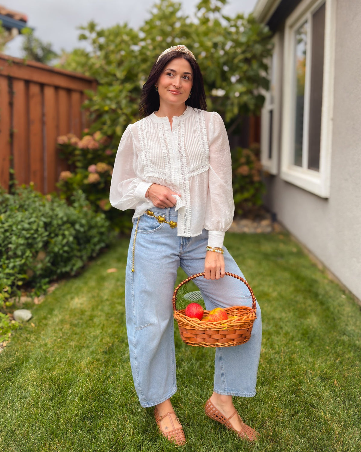 White cotton lace blouse with relaxed fit and feminine pintuck details