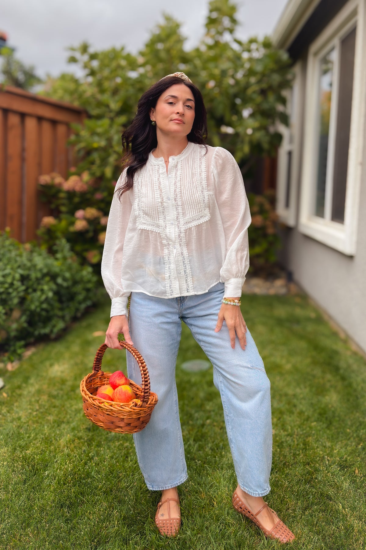 White semi sheer cotton blouse with button front and romantic lace details