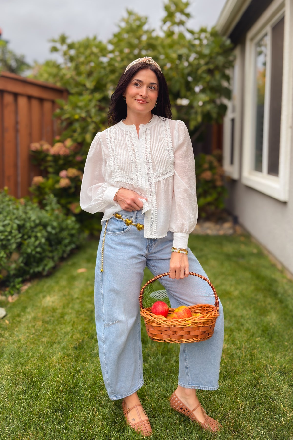 Relaxed white button down top with pintuck front and soft bishop sleeves
