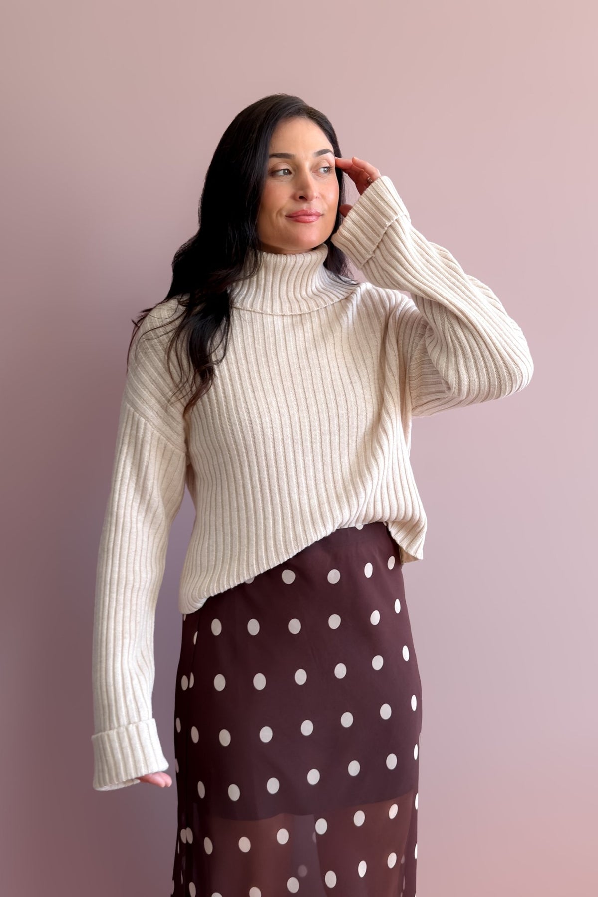 Beige ribbed turtleneck top with long sleeves and slightly boxy everyday fit