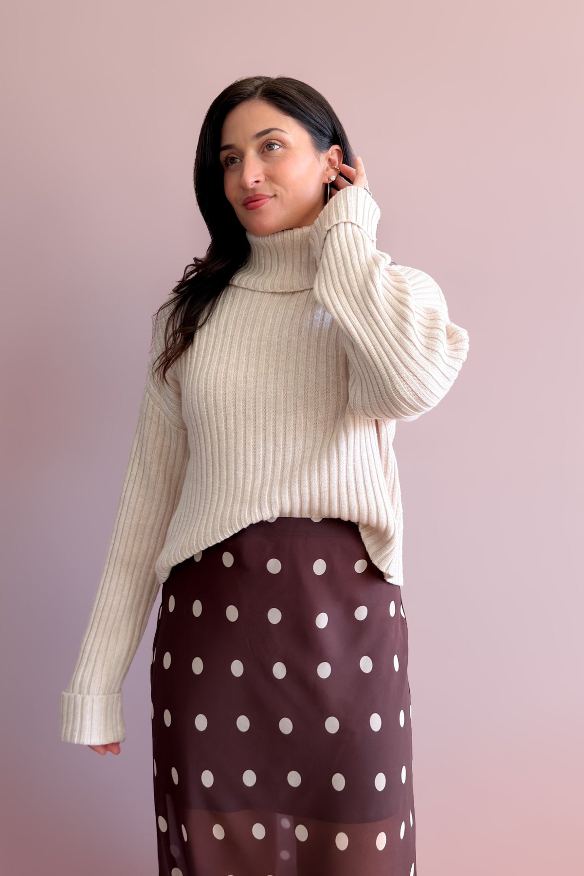 Women’s neutral merino wool blend sweater styled for fall and winter layering