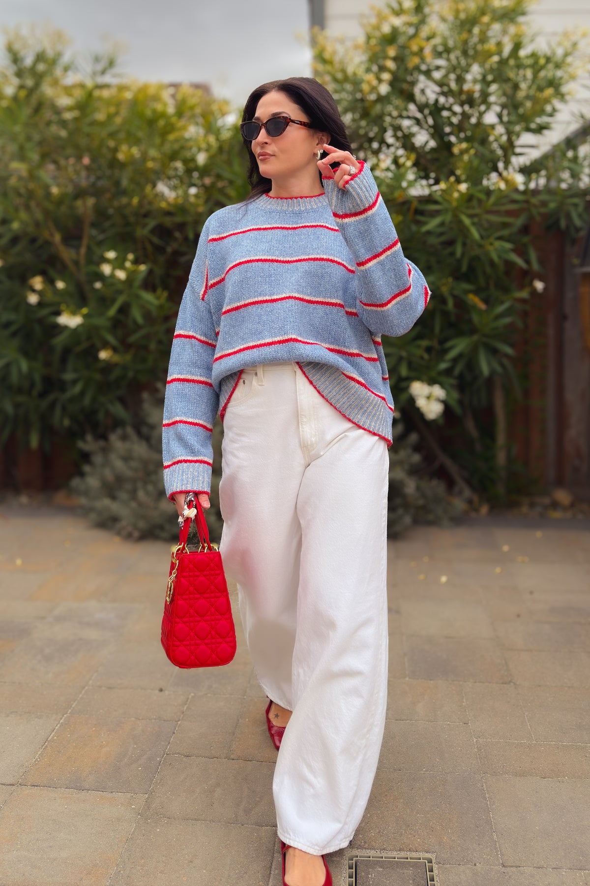 Women’s blue striped sweater with red and ivory stripes and drop shoulders