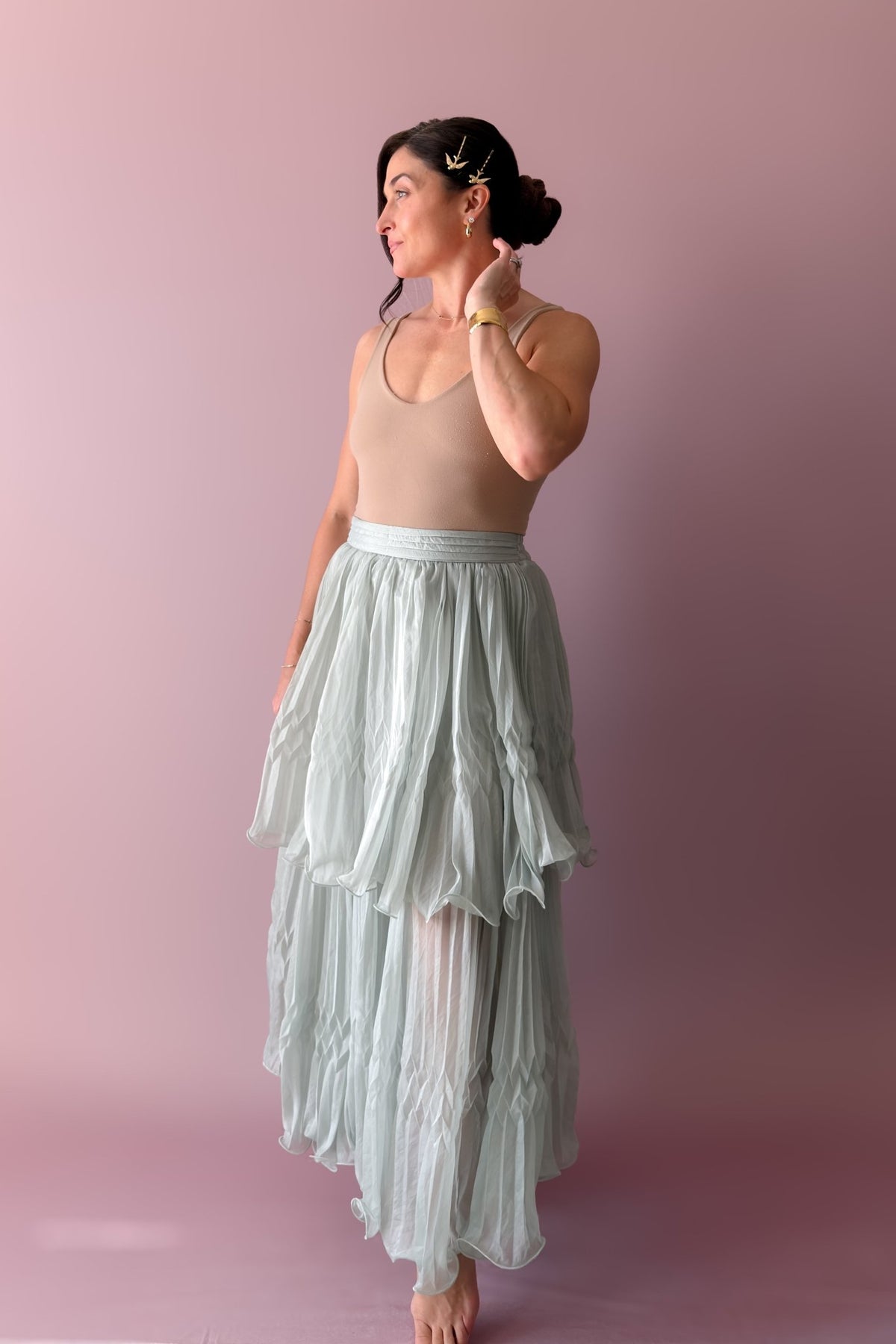 Soft mint pleated maxi skirt set with dramatic cape sleeves and romantic bow detail