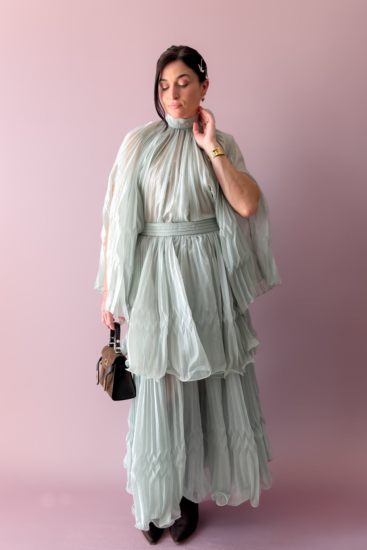 Women’s mint pleated chiffon skirt set with high neckline, flowing cape sleeves and layered maxi skirt