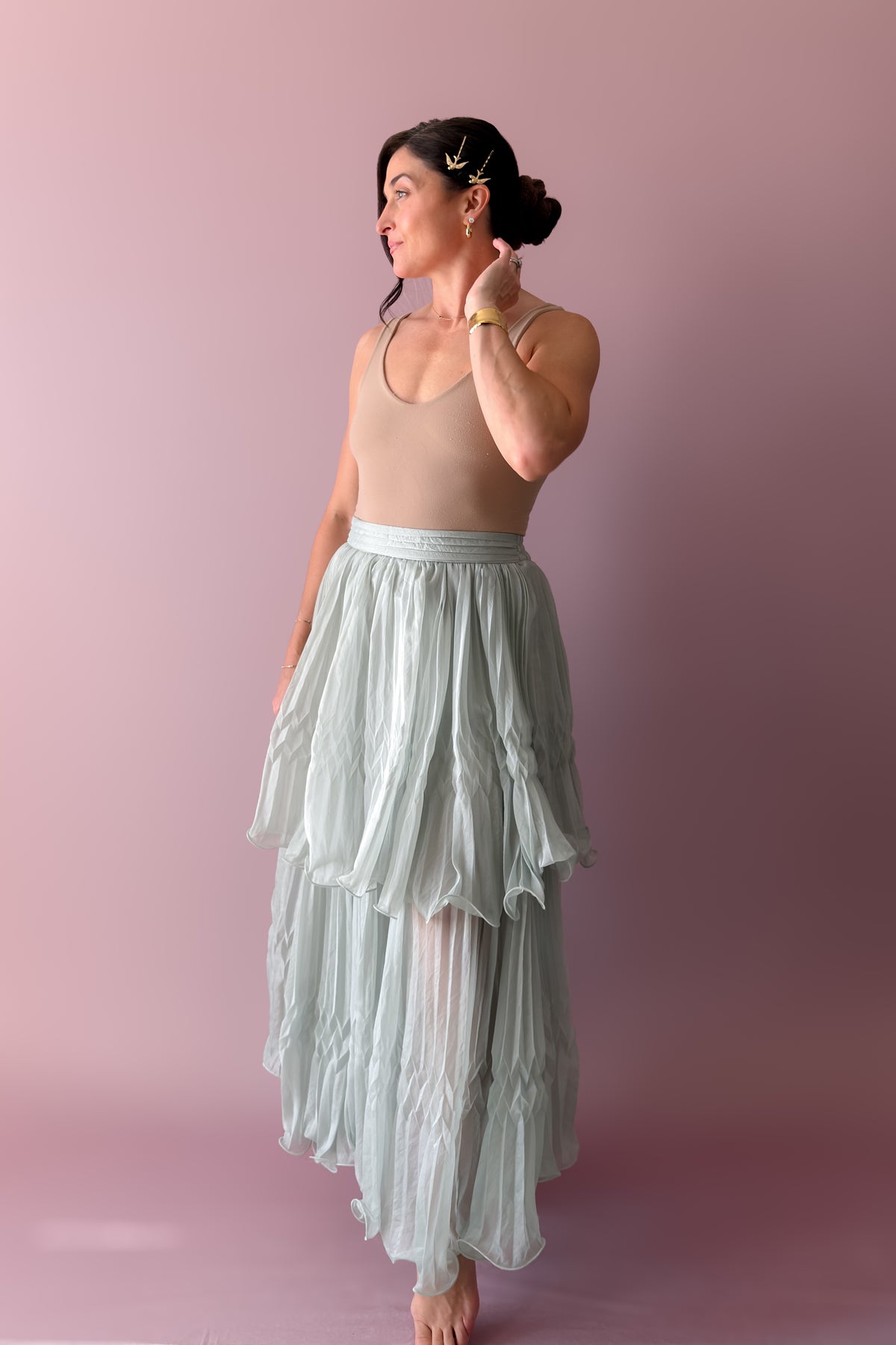 Soft mint pleated maxi skirt set with dramatic cape sleeves and romantic bow detail