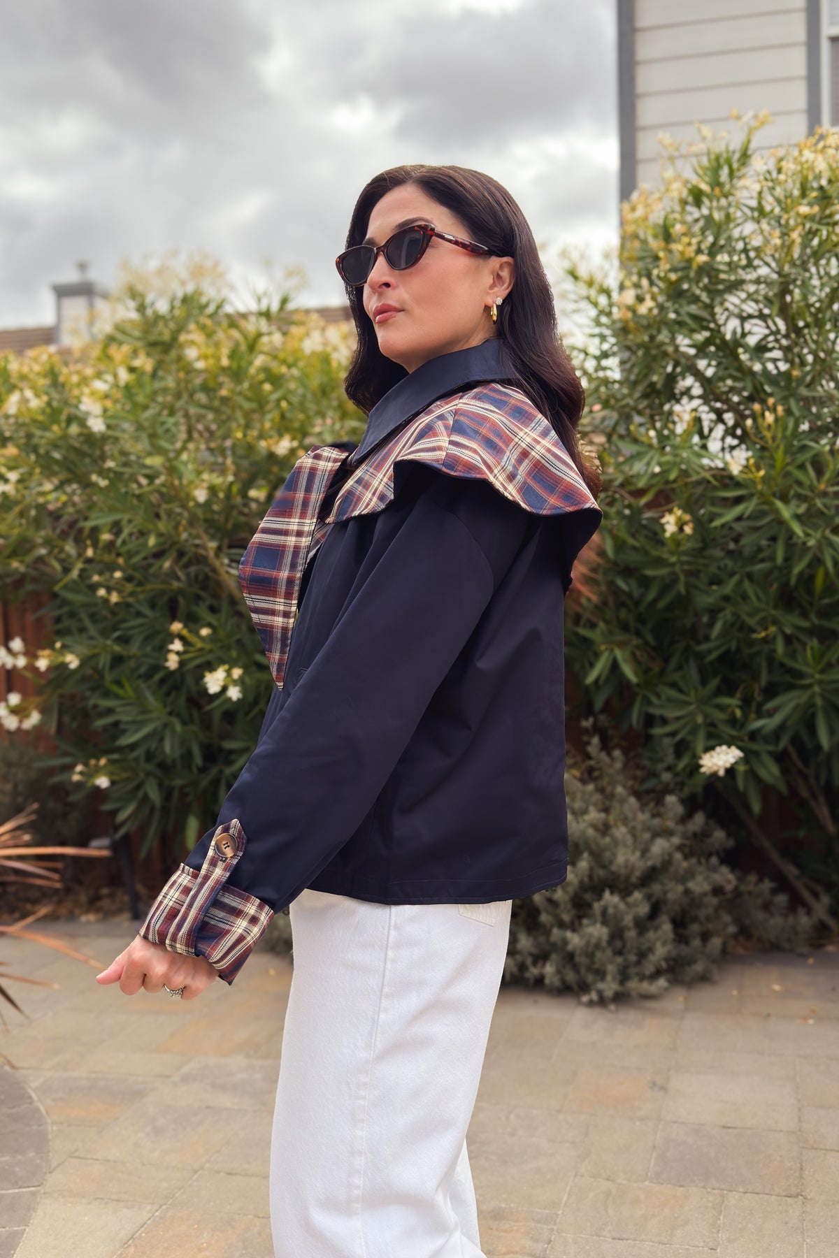 Navy and brown plaid women’s jacket with removable cape detail and soft cotton outer
