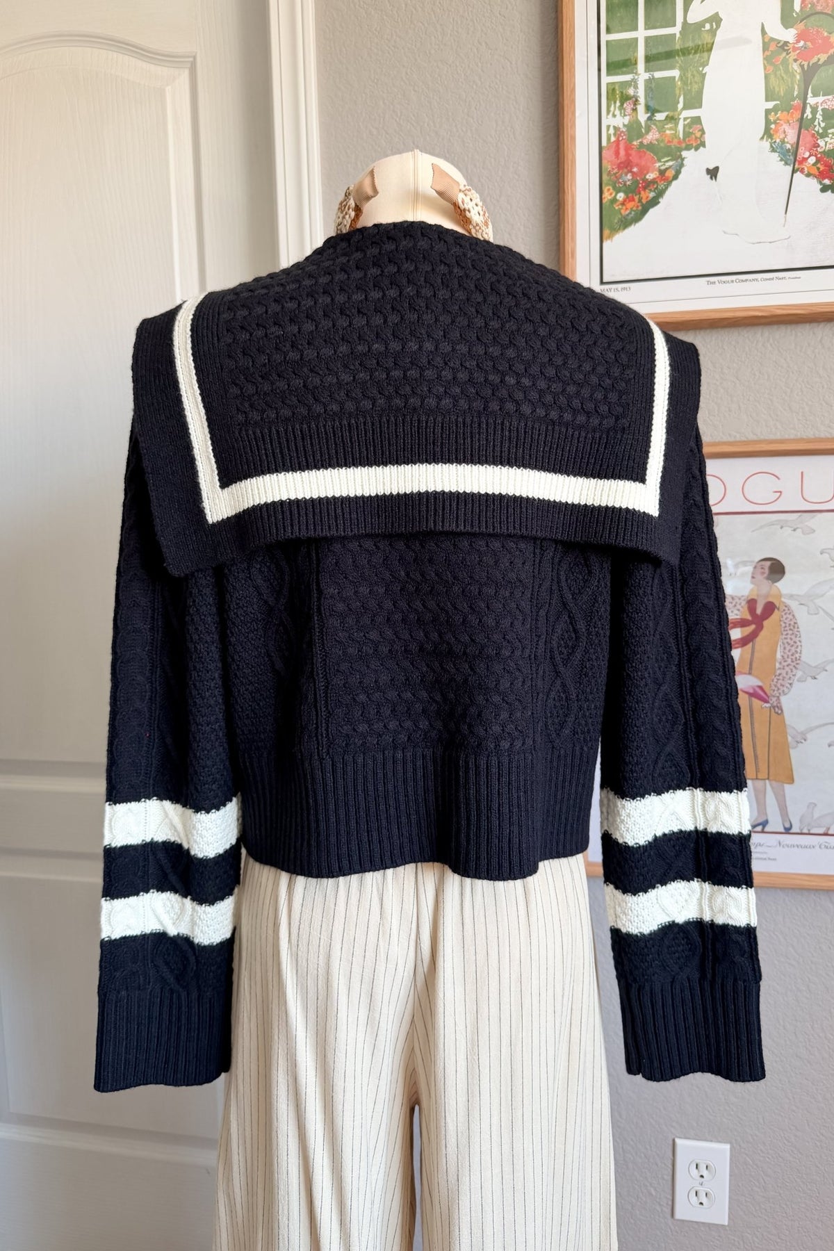 Soft Heritage Romance navy cable knit cardigan featuring ivory sailor collar detailing and a warm non-itchy knit texture.