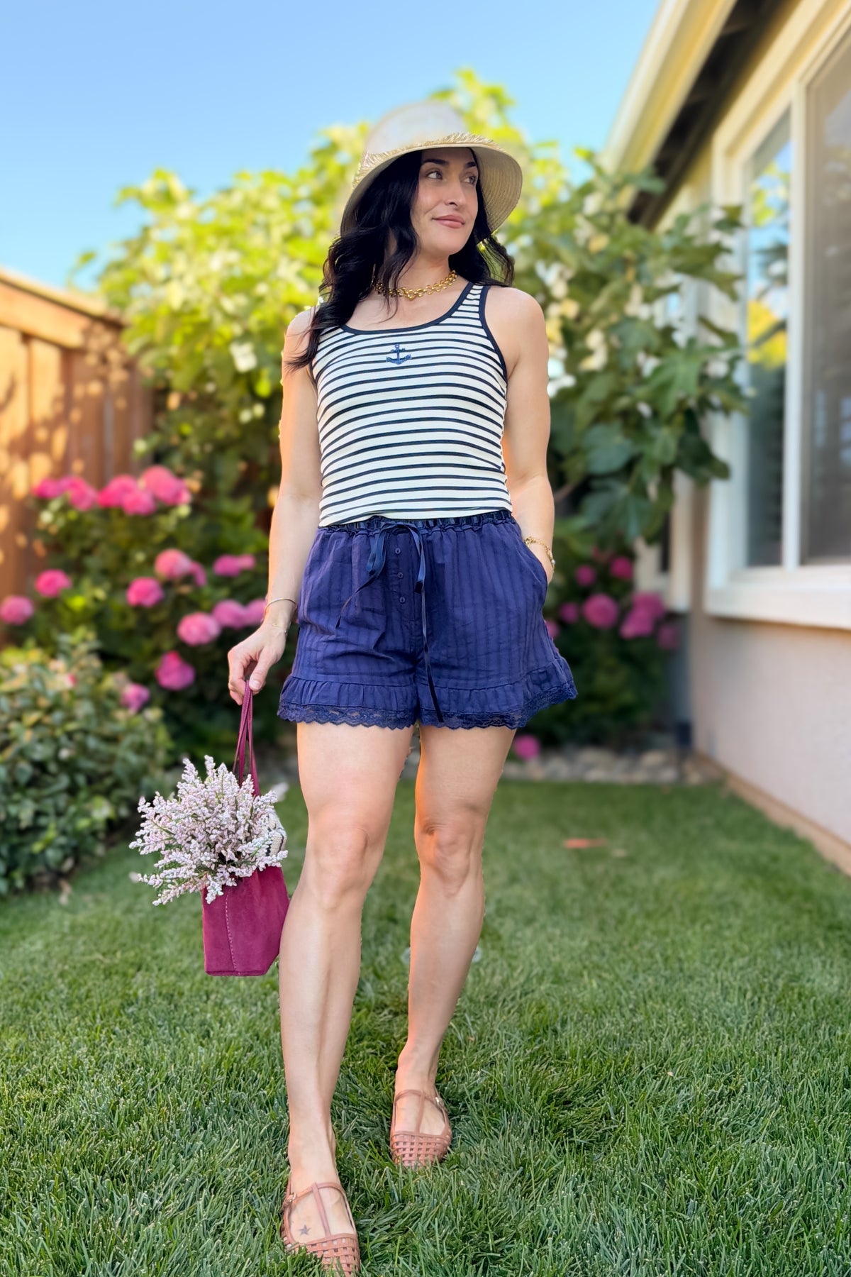 Comfortable navy cotton shorts for women with feminine lace detailing and relaxed fit.