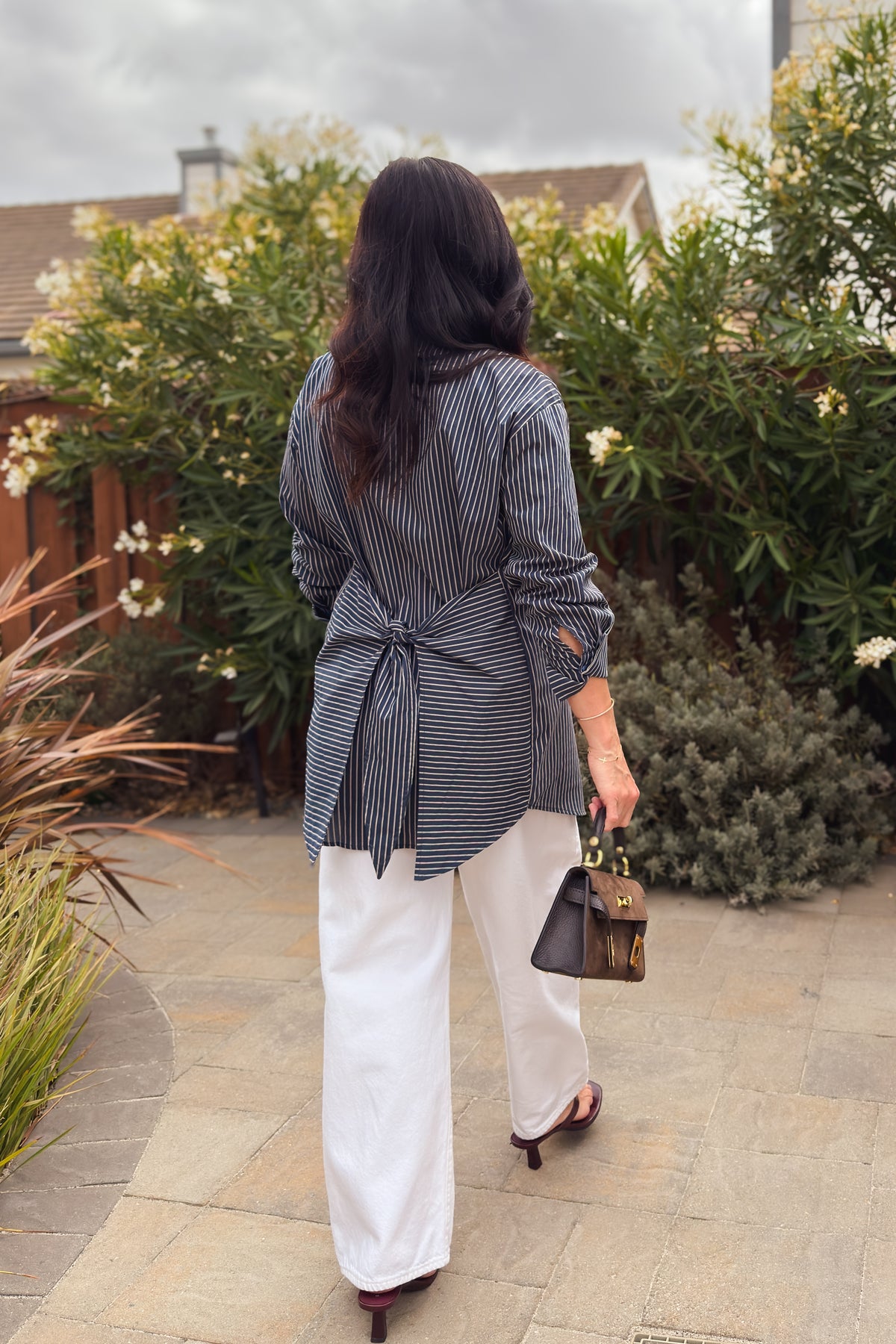 Navy and white striped cotton shirt dress with reversible tie waist, relaxed oversized fit and versatile button-down styling for fall.