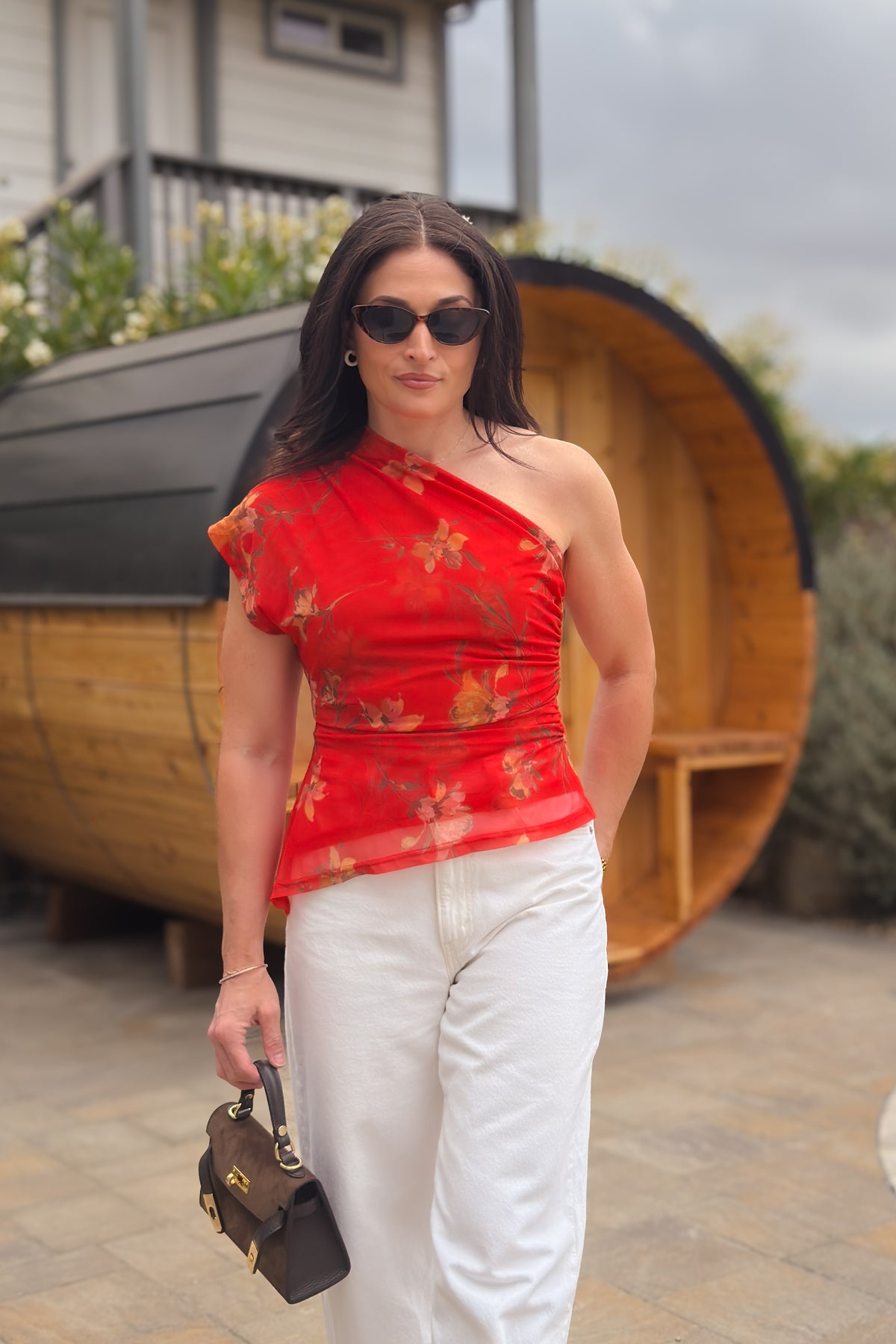 Red floral one shoulder mesh top with side ruching and asymmetrical hem