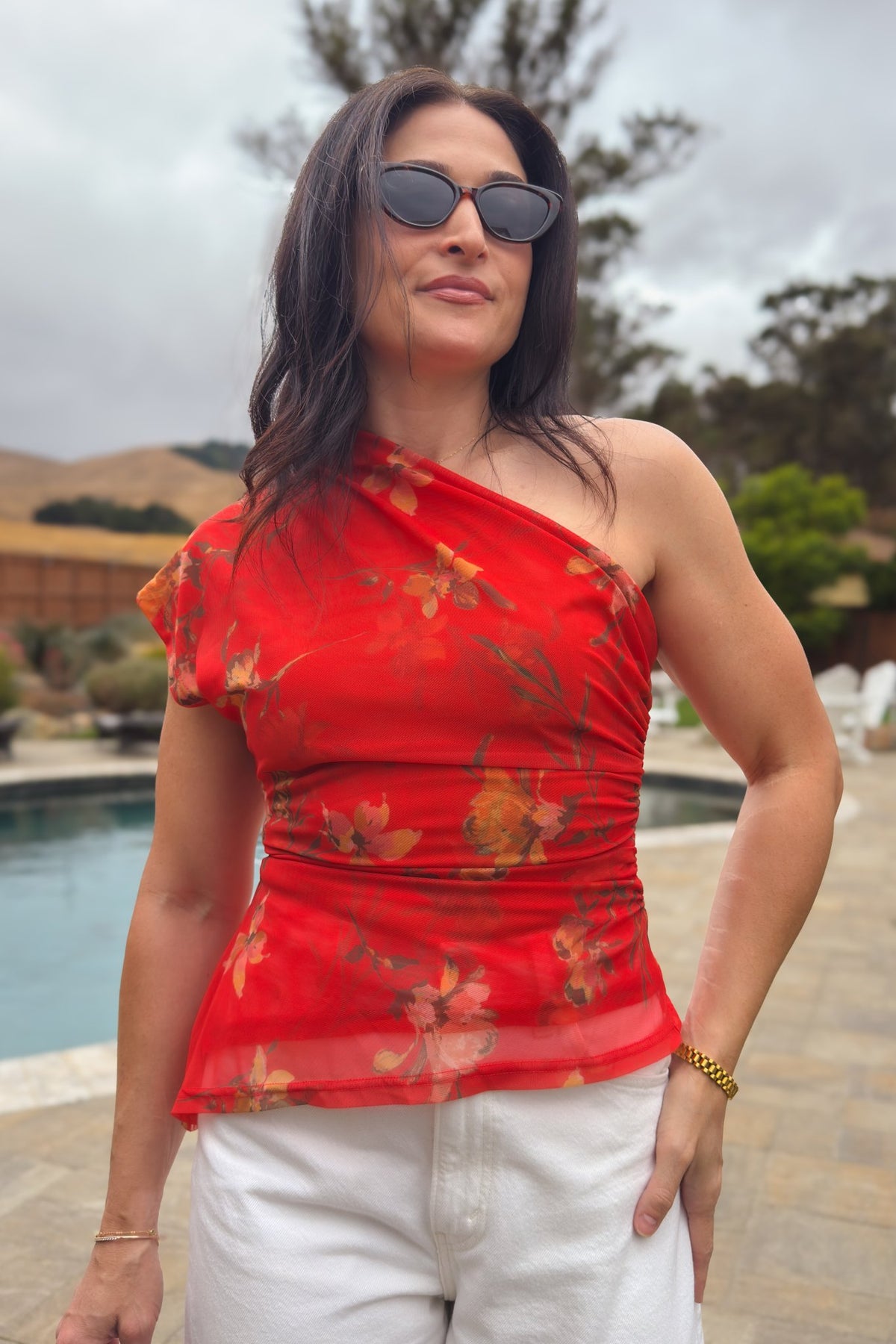 Soft ruched floral one shoulder top in vivid red orange with high stretch