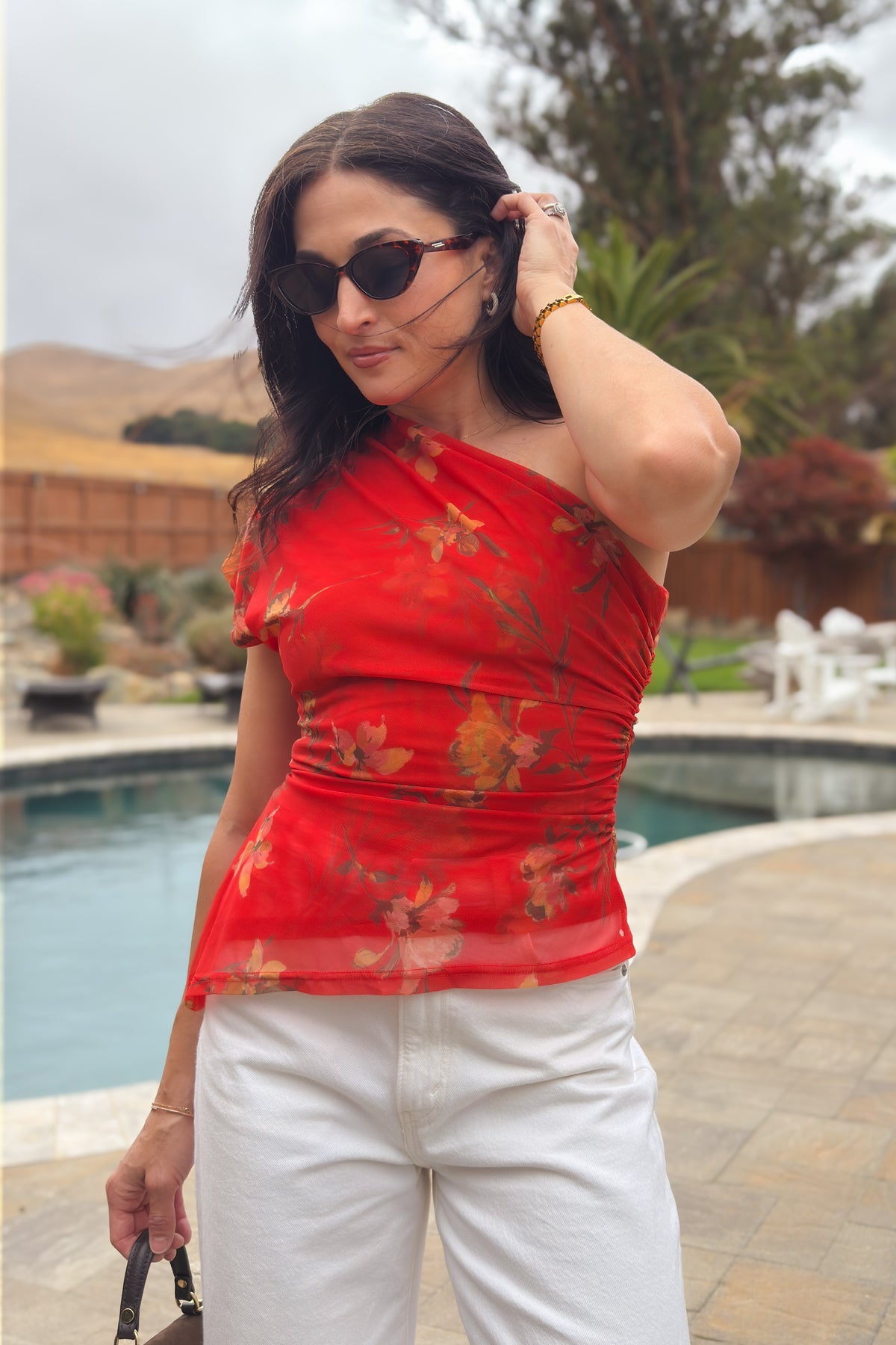 Women’s floral one shoulder top with semi sheer mesh and flattering ruched waist