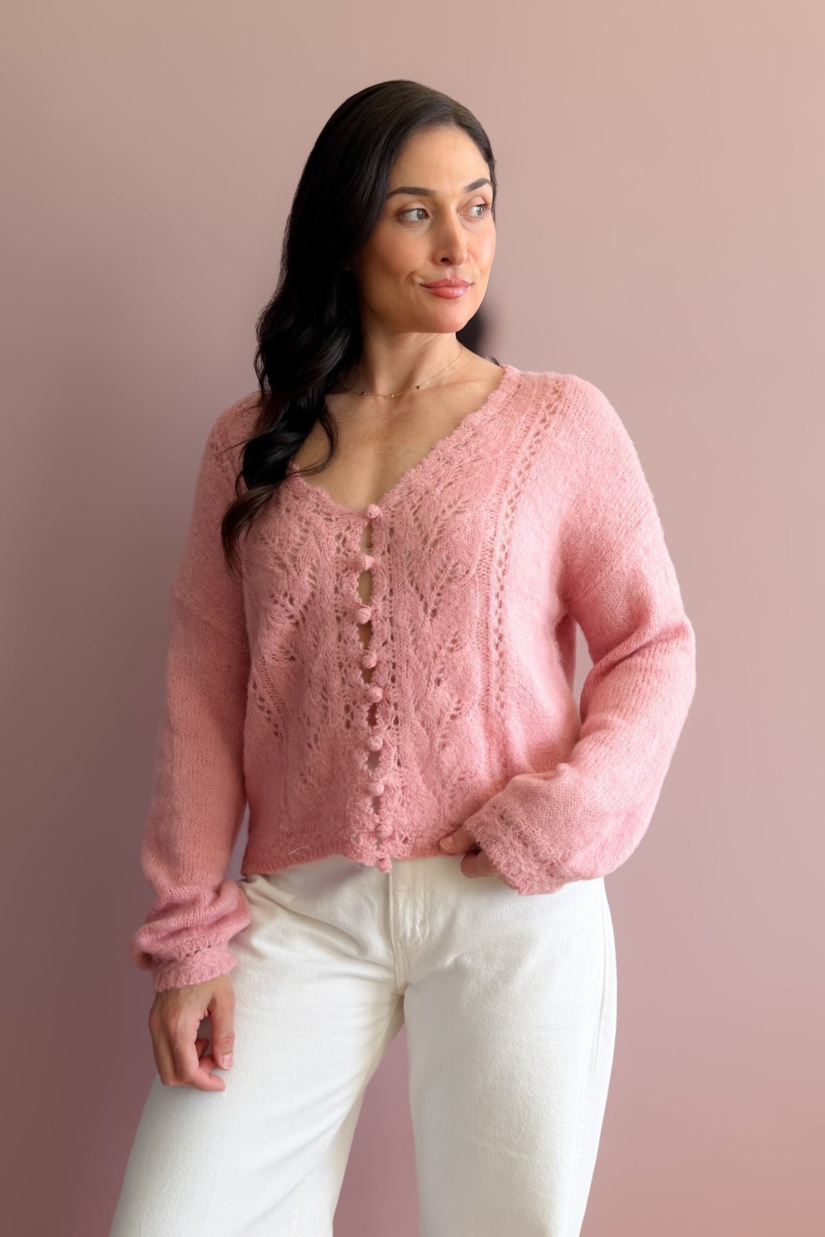 1. Women’s pointelle knit V-neck sweater in soft pink with a delicate textured front and easy relaxed silhouette