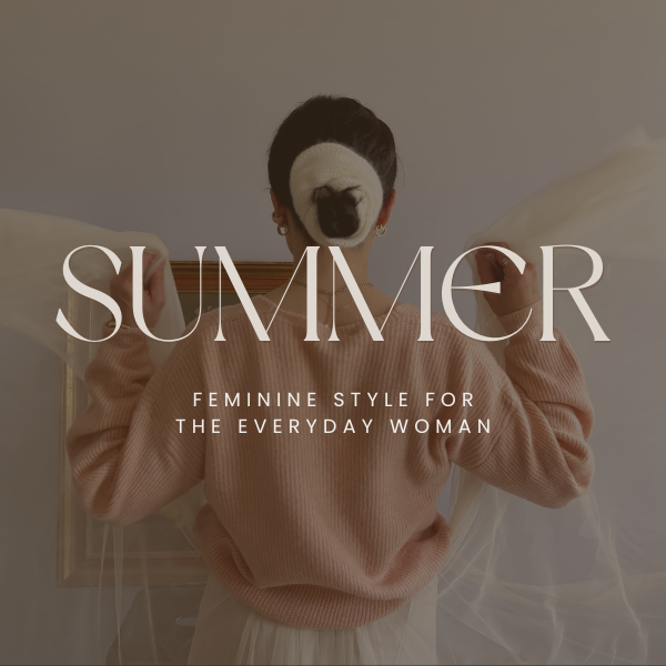 **Alt Text:**  
Woman wearing a blush pink sweater and white tulle skirt with a white hair wrap, standing with arms lifted holding sheer fabric. The text overlay reads "SUMMER – Feminine Style for the Everyday Woman" in elegant serif font. The overall aesthetic is soft, romantic, and Parisian-inspired.