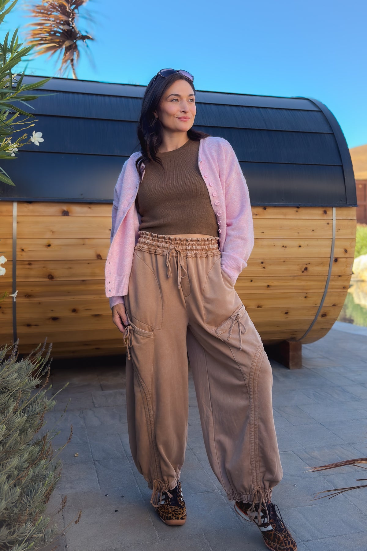 Women’s tan drawstring cargo pants with elastic waistband, cargo pockets and adjustable ankles