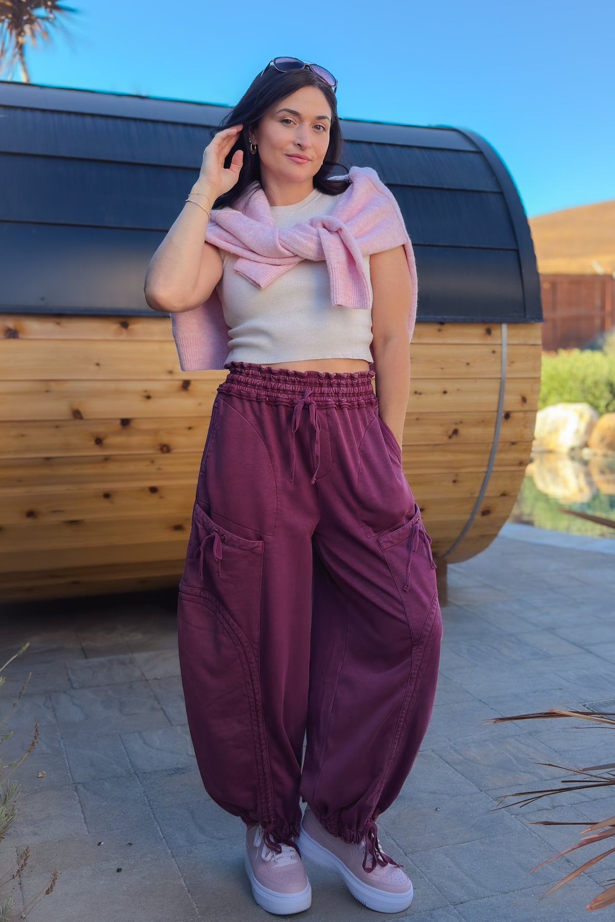 Women’s burgundy utility pants with garment-dyed mineral wash finish and cinchable ankles