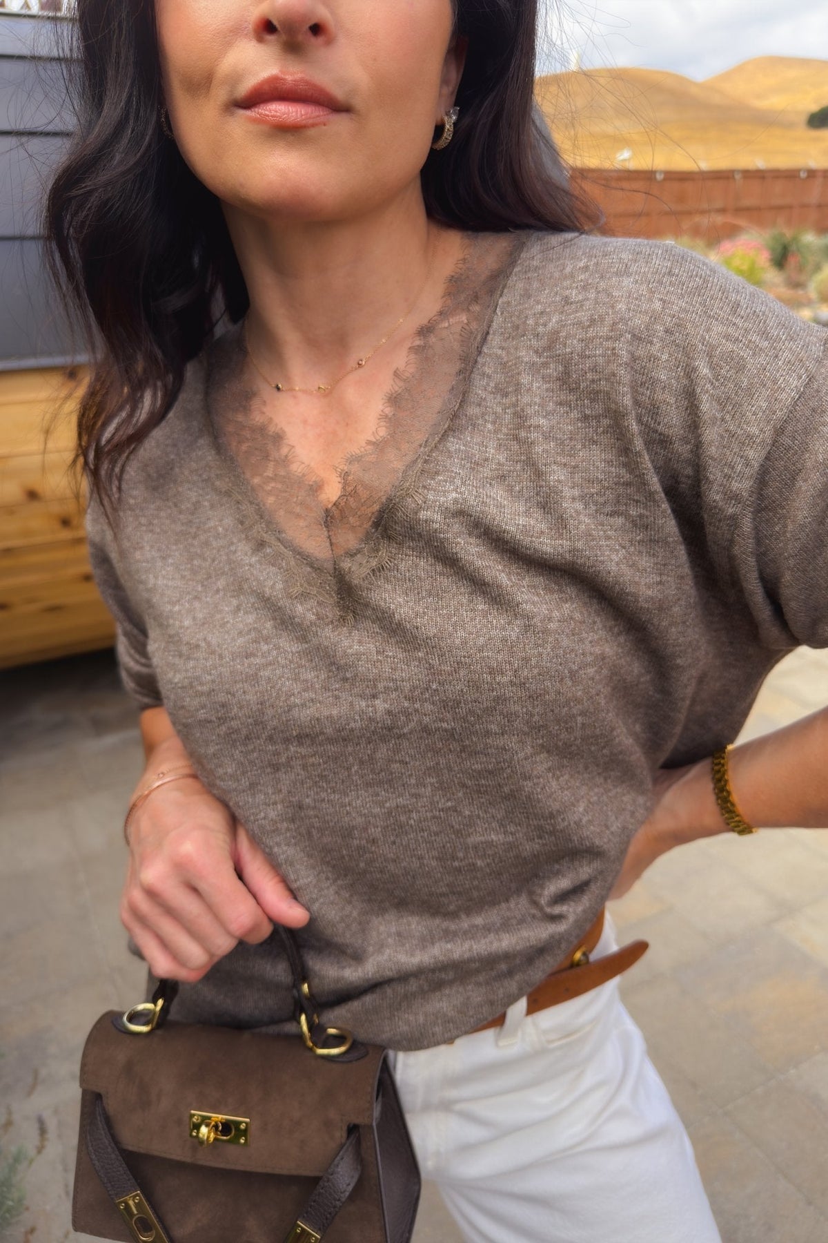 Lightweight taupe brown knit sweater with oversized fit and lace trim V-neck