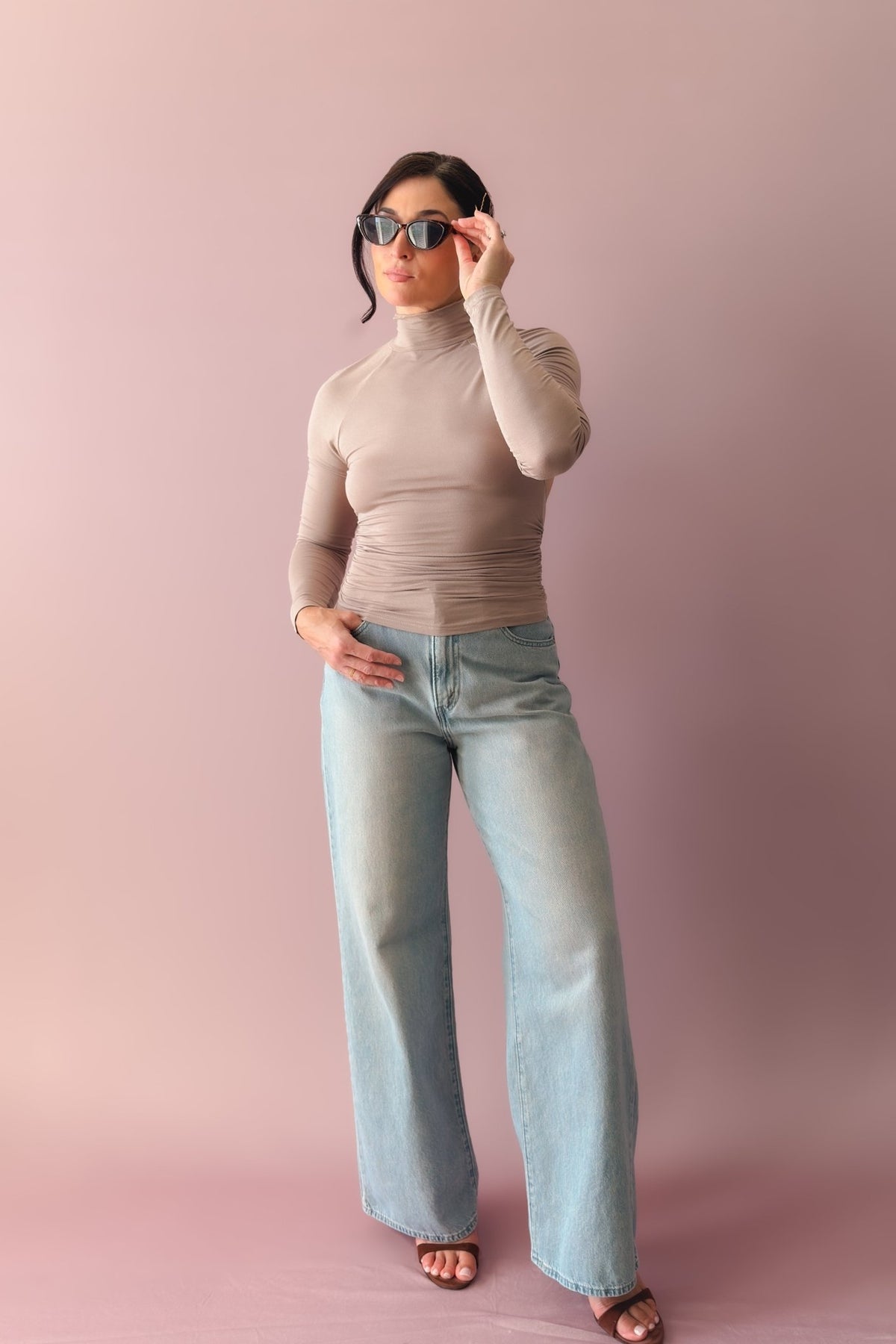 Elevated neutral taupe layering top with long sleeves and open back detail