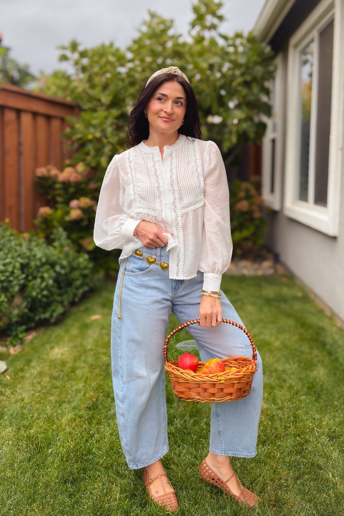 Relaxed white button down top with pintuck front and soft bishop sleeves