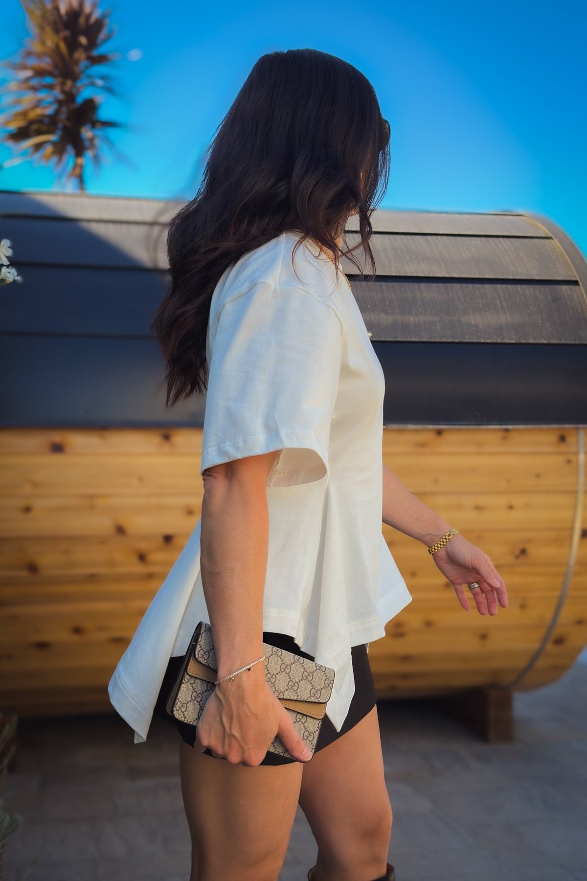 Women’s white peplum T-shirt made from heavyweight 100% cotton with a structured fit and sculpted waist.