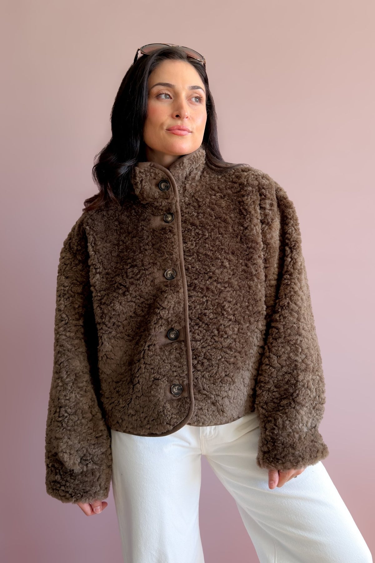 Soft chocolate brown button-front sherpa jacket styled as an elevated everyday layer