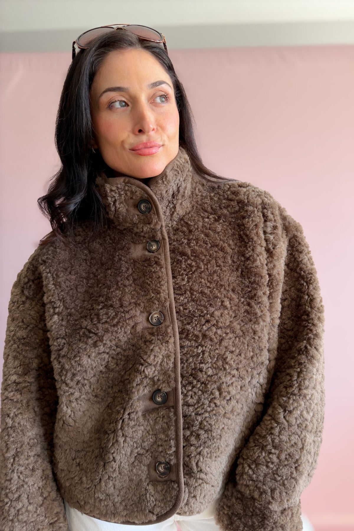 Women’s plush brown sherpa jacket with drop shoulders and a cozy relaxed silhouette