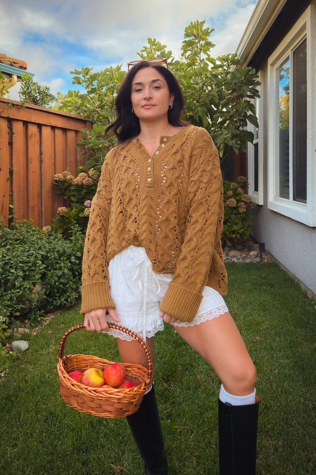 Women’s cable knit Henley sweater in warm camel with oversized silhouette