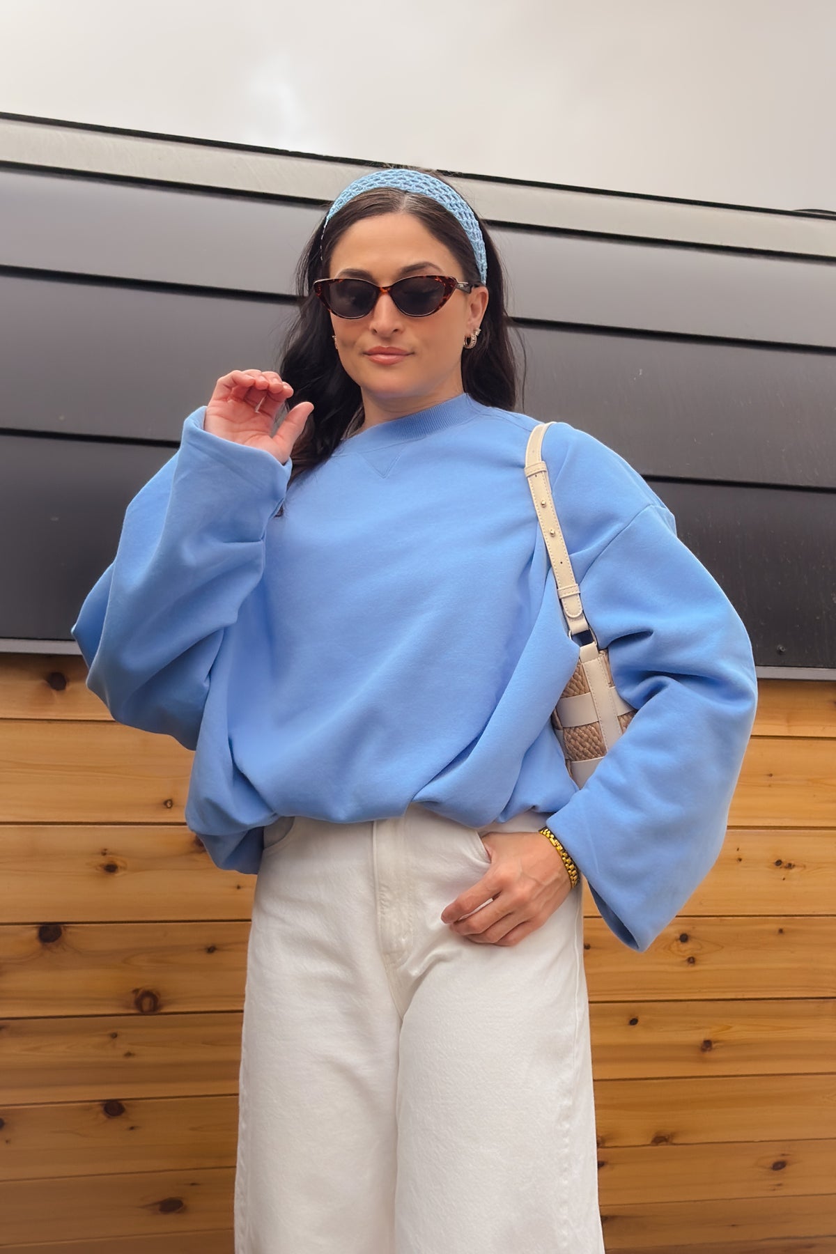Cornflower blue bubble hem sweatshirt with oversized sleeves and boxy silhouette