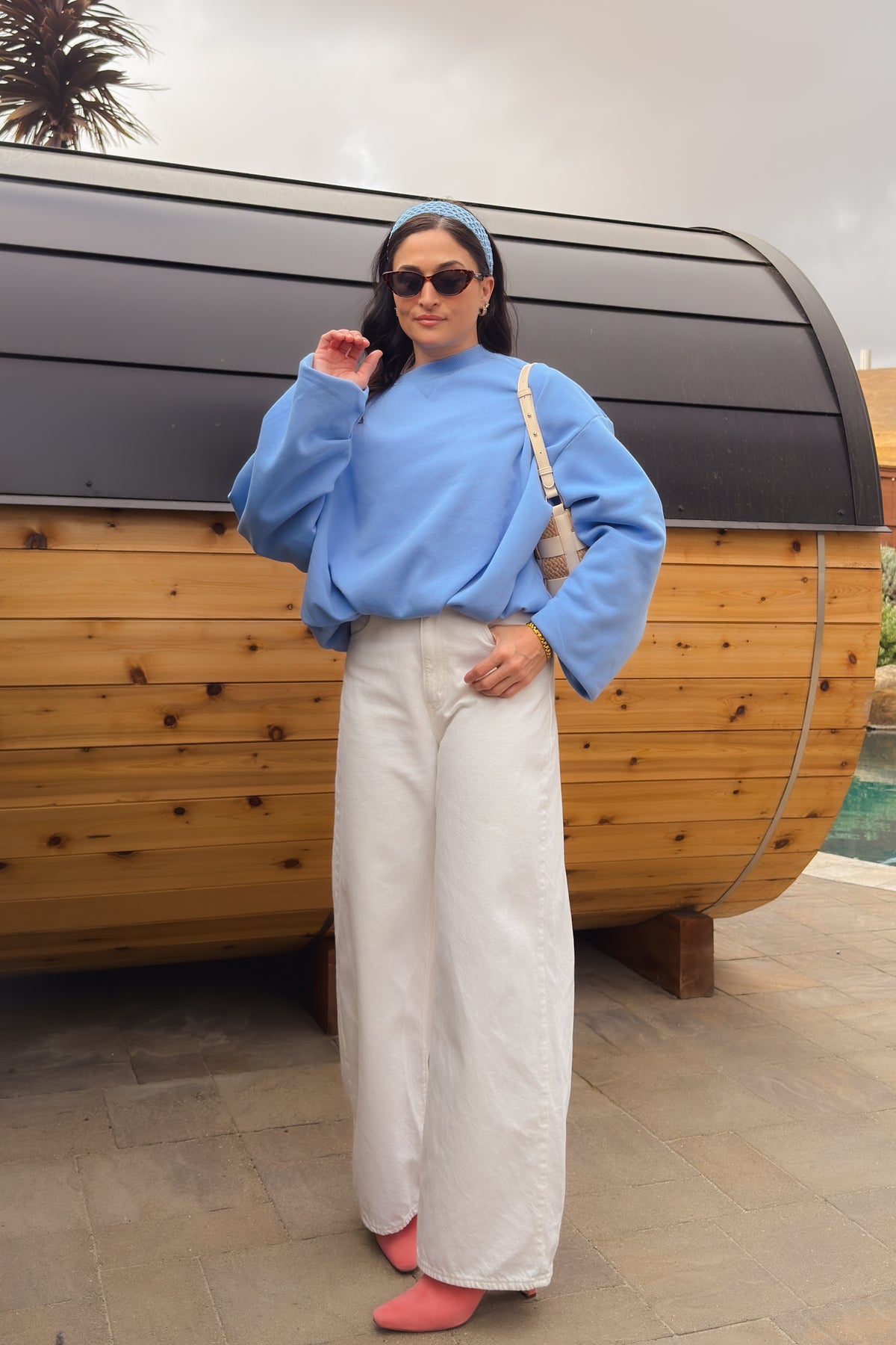 Cornflower blue crewneck sweatshirt with relaxed oversized fit and gathered bubble hem