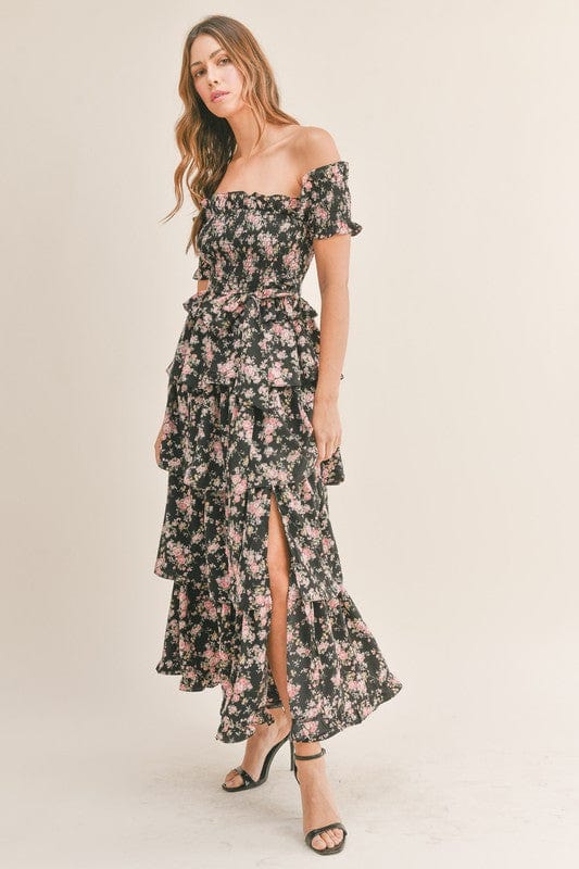 Shop Elegant Romance Unveiled | Black Floral Print Maxi Dress with Tiered Ruffles at Blooming Daily M Shop Elegant Romance Unveiled | Black Floral Print Maxi Dress with Tiered Ruffles at Blooming Daily M