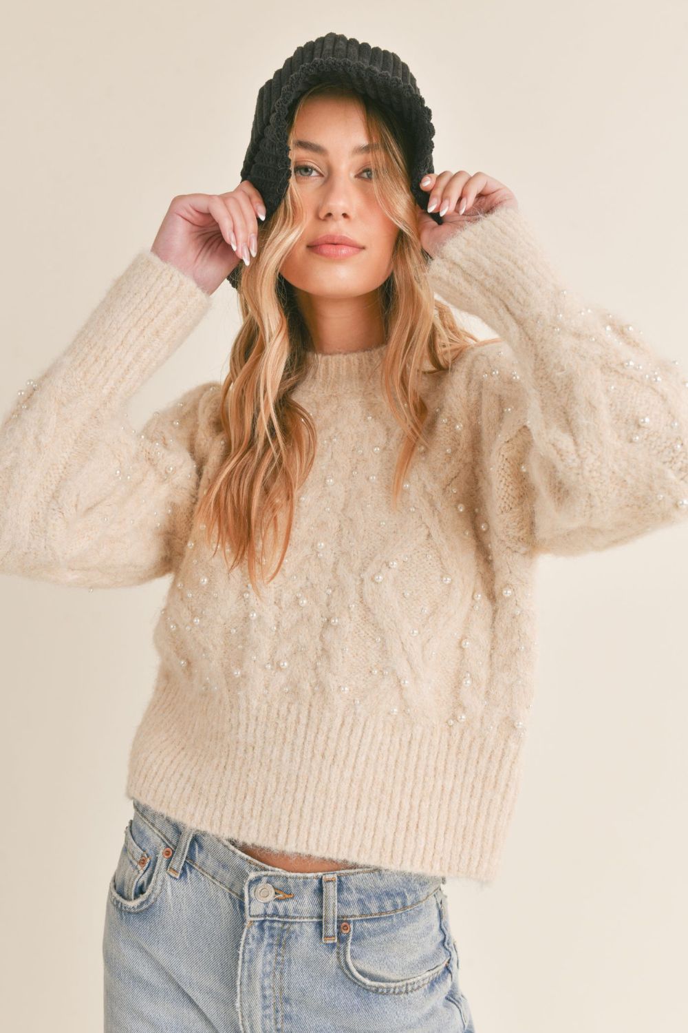 Knitted jumper with cable knit pattern made of soft blended wool